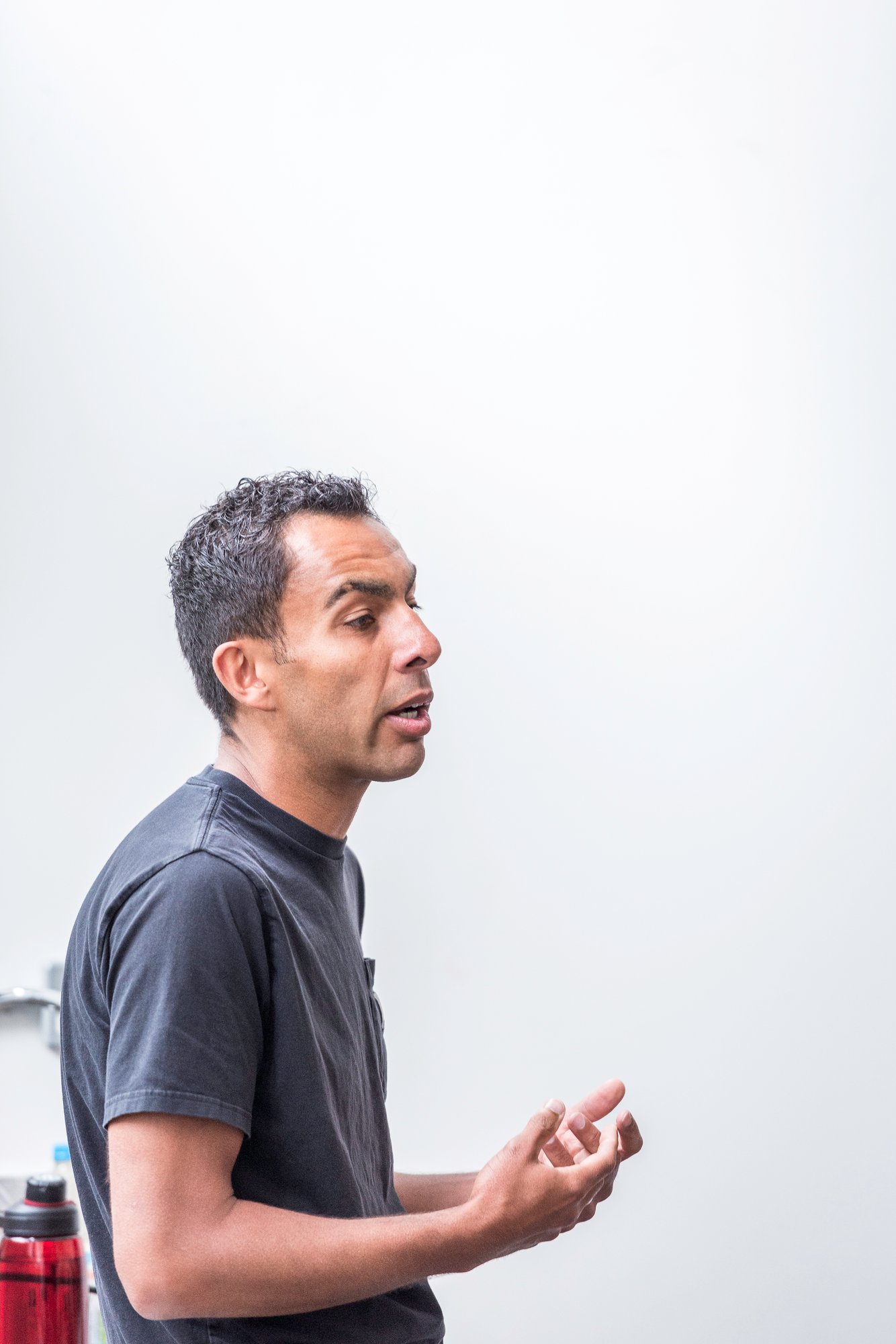 Man working with whiteboard in UK office Tom Barrett at Avidly