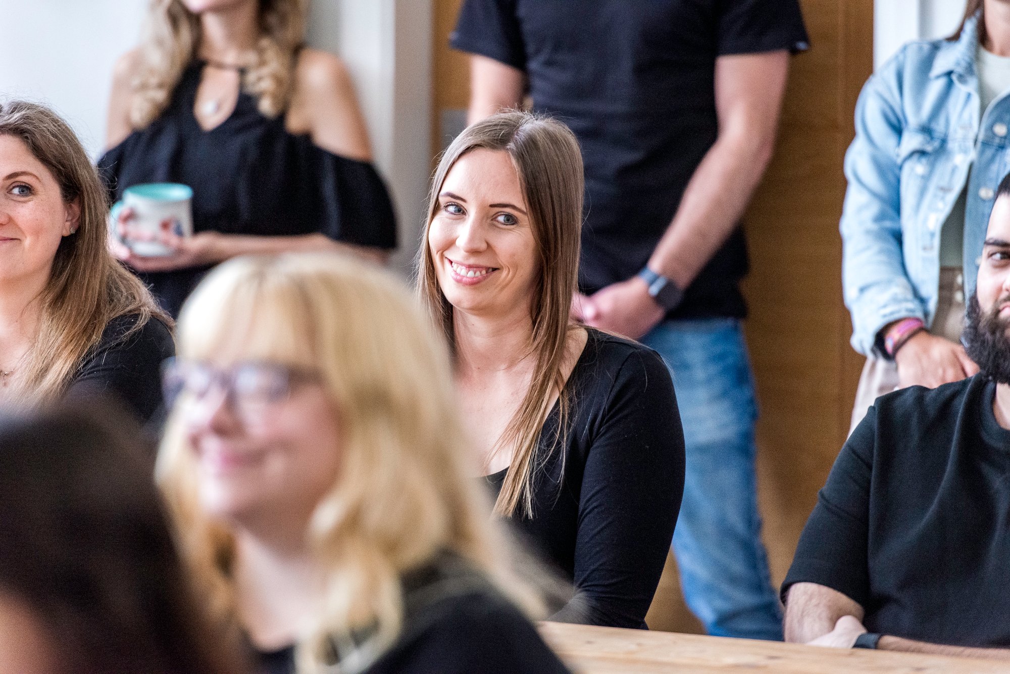 Woman smiling in UK office at Avidly Rachel Johnson PM