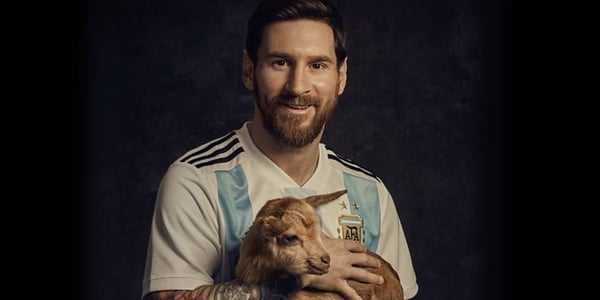 Messi with a goat