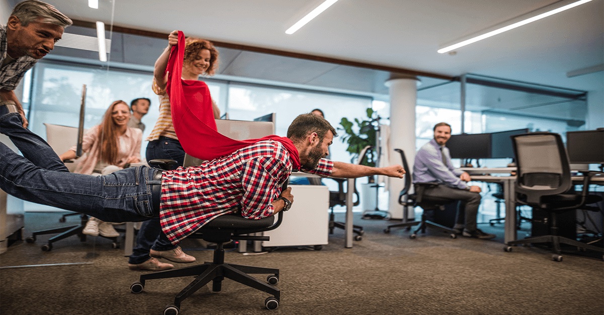 superman-pose-slide-on-office-chair-cape